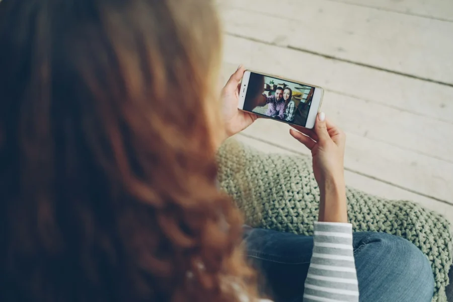 Woman watching a video on her smartphone